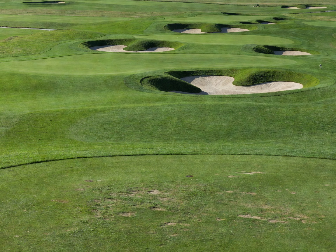 Practice area with pitching greens and bunkers